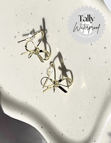  Gold Ribbon Bow Earrings - TallyGold Ribbon Bow EarringsthinlilbowGold Ribbon Bow Earrings